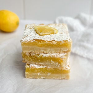 3 easy lemon bars stacked on top of each other.