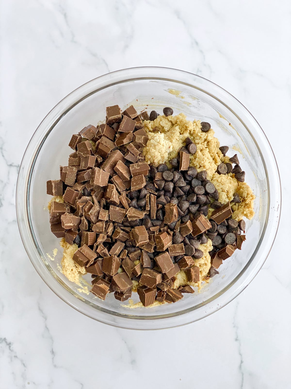 Chocolate chunk cookie dough preparation.