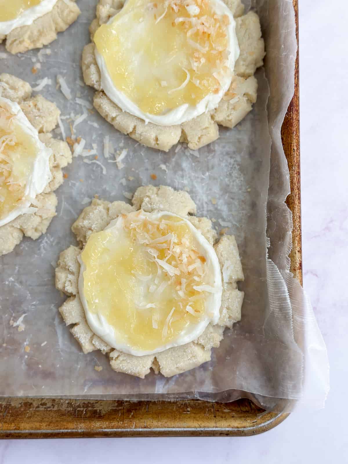 A pina colada cookie on a cookie sheet.