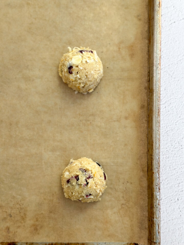 cookie dough on a baking sheet before baking.