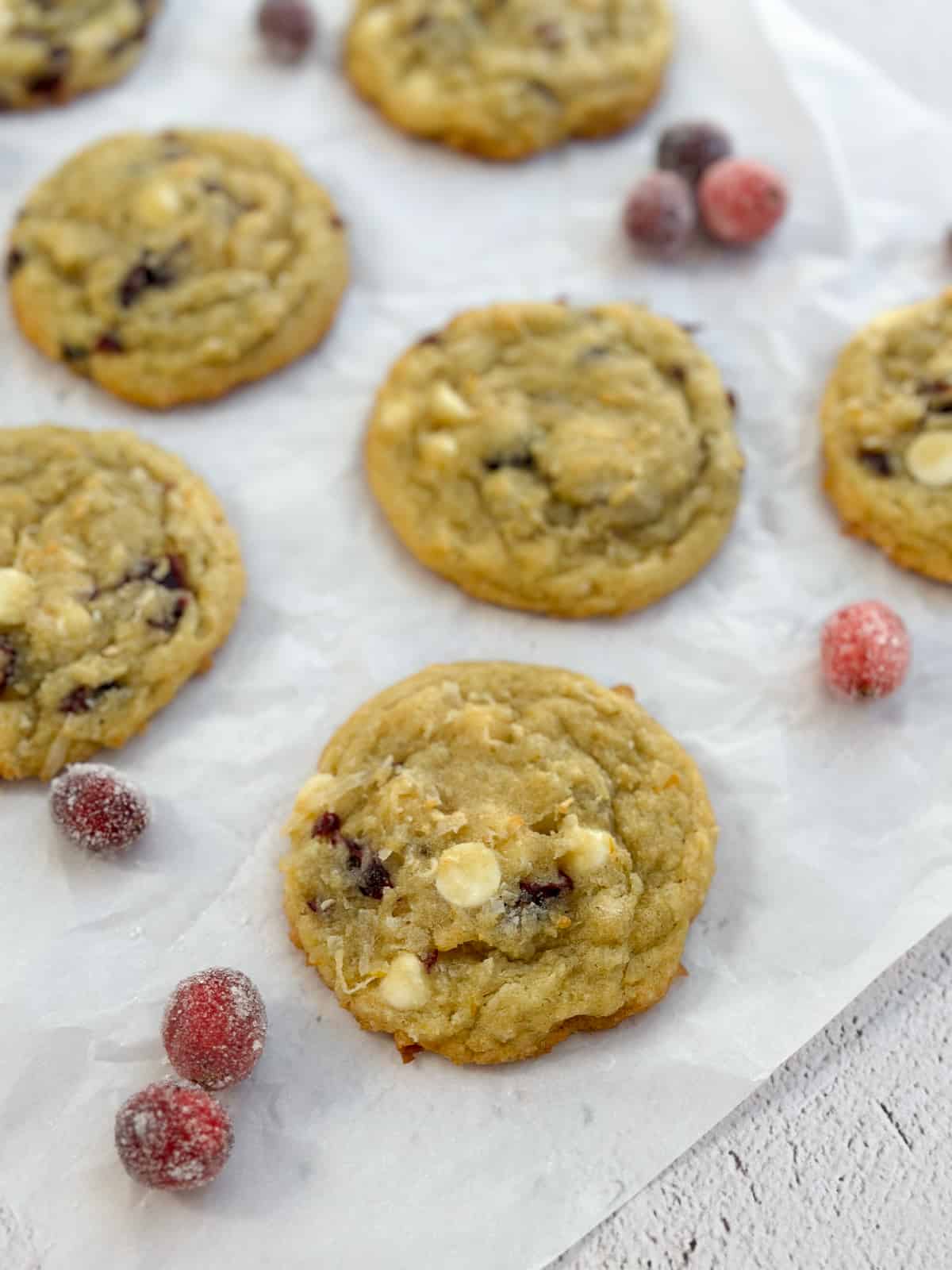 a side view of some white chocolate orange cranberry cookies.