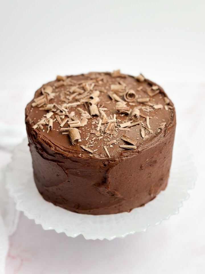 the whole small chocolate cake with some chocolate shavings on top.