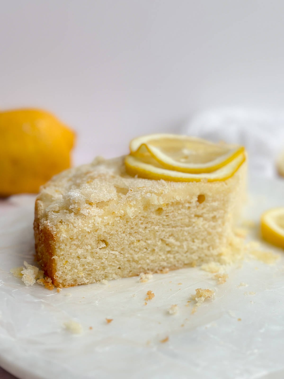A side view of this easy lemon snack cake so you can see the inside once cut.