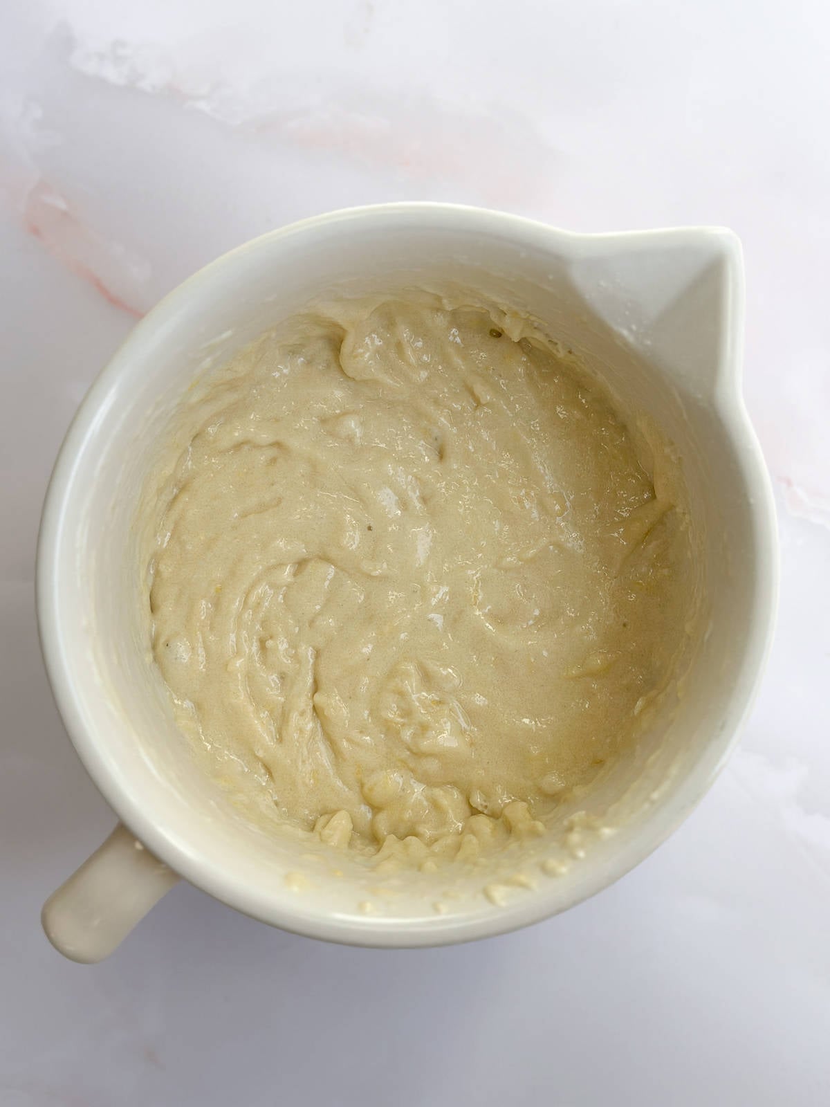 adding in wet ingredients.