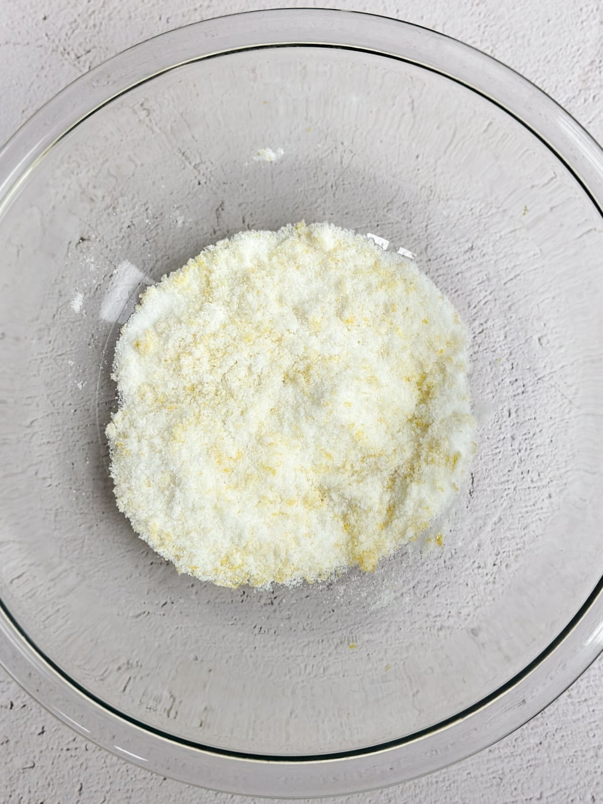 Sugar and lemon zest mixed together.