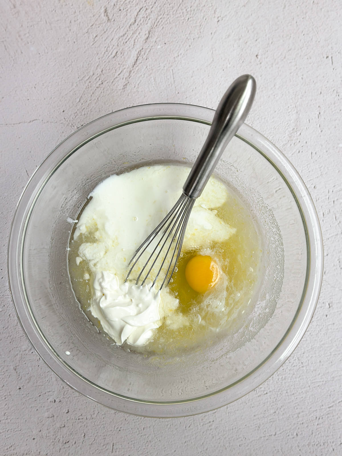 adding in wet ingredients.