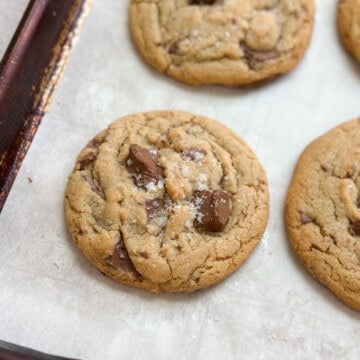 a brown butter peanut butter cookie on a baking sheet.