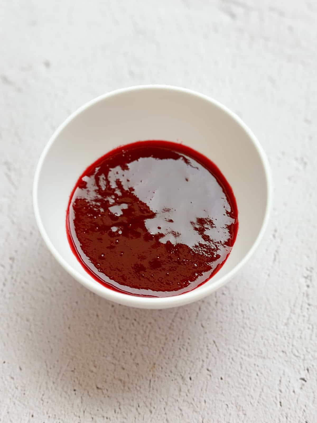raspberry sauce after it's been strained.