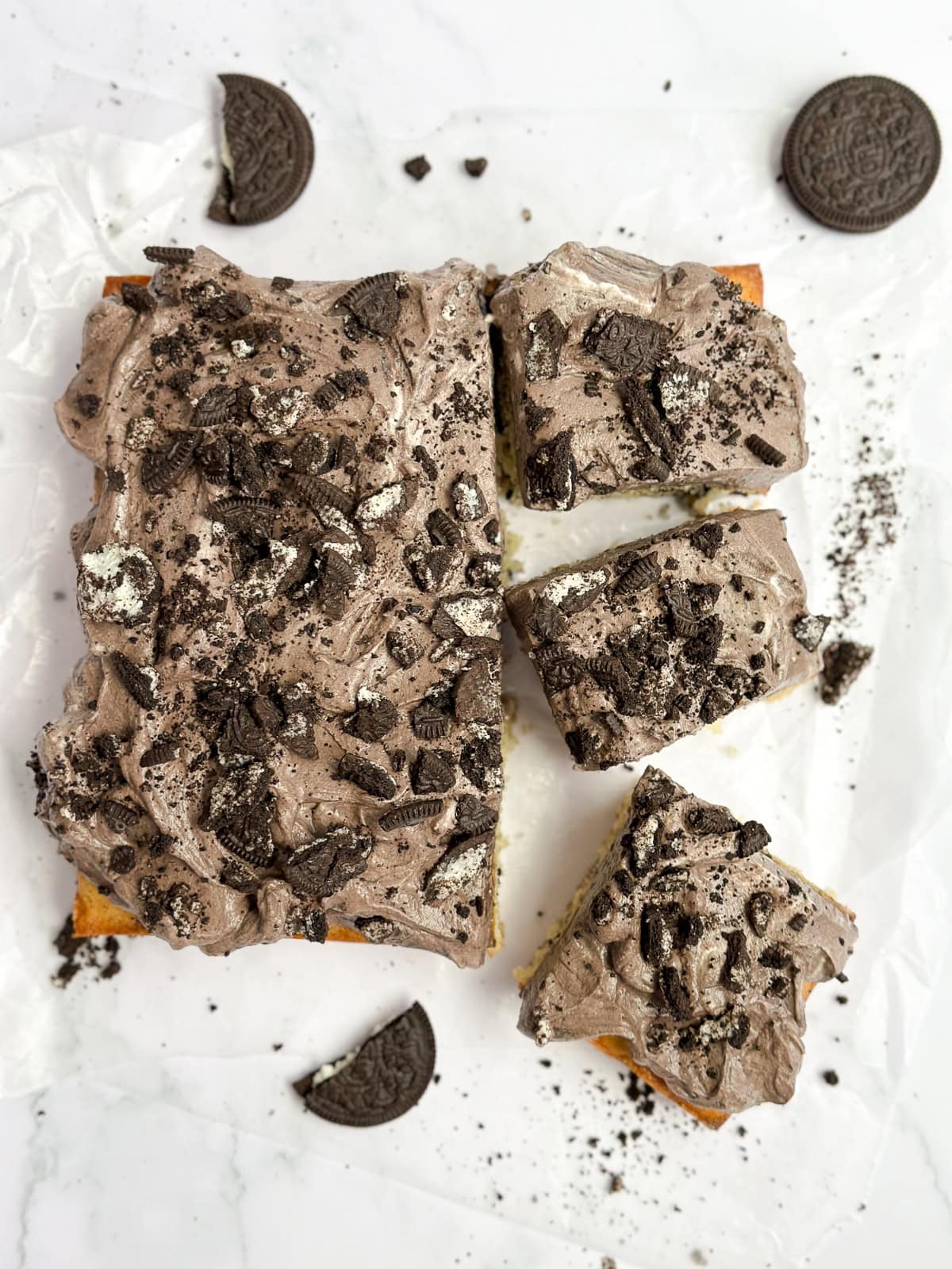 showing the cookies and cream cake cut into some slices.