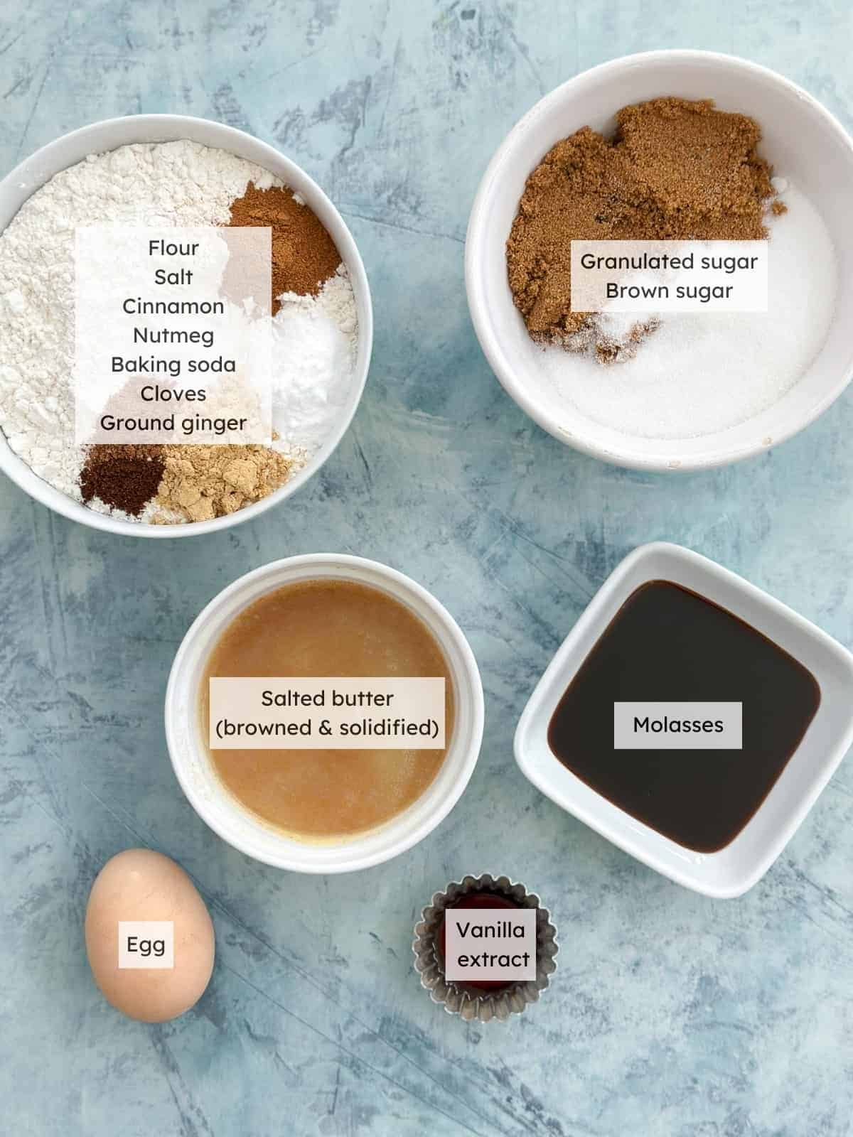 All of the ingredients needed to make Molasses Crinkle cookies.