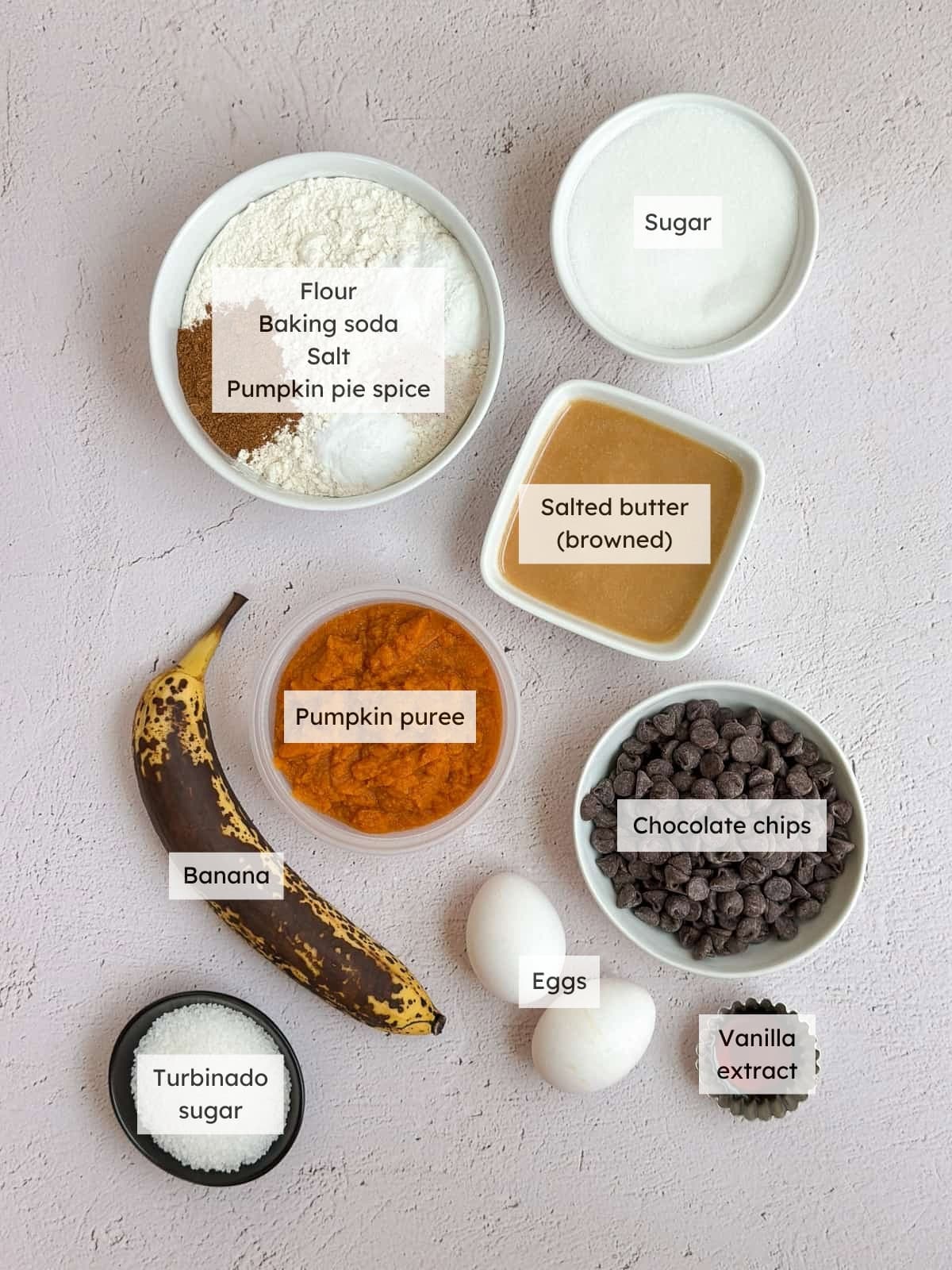 All the ingredients needed to make pumpkin banana muffins.