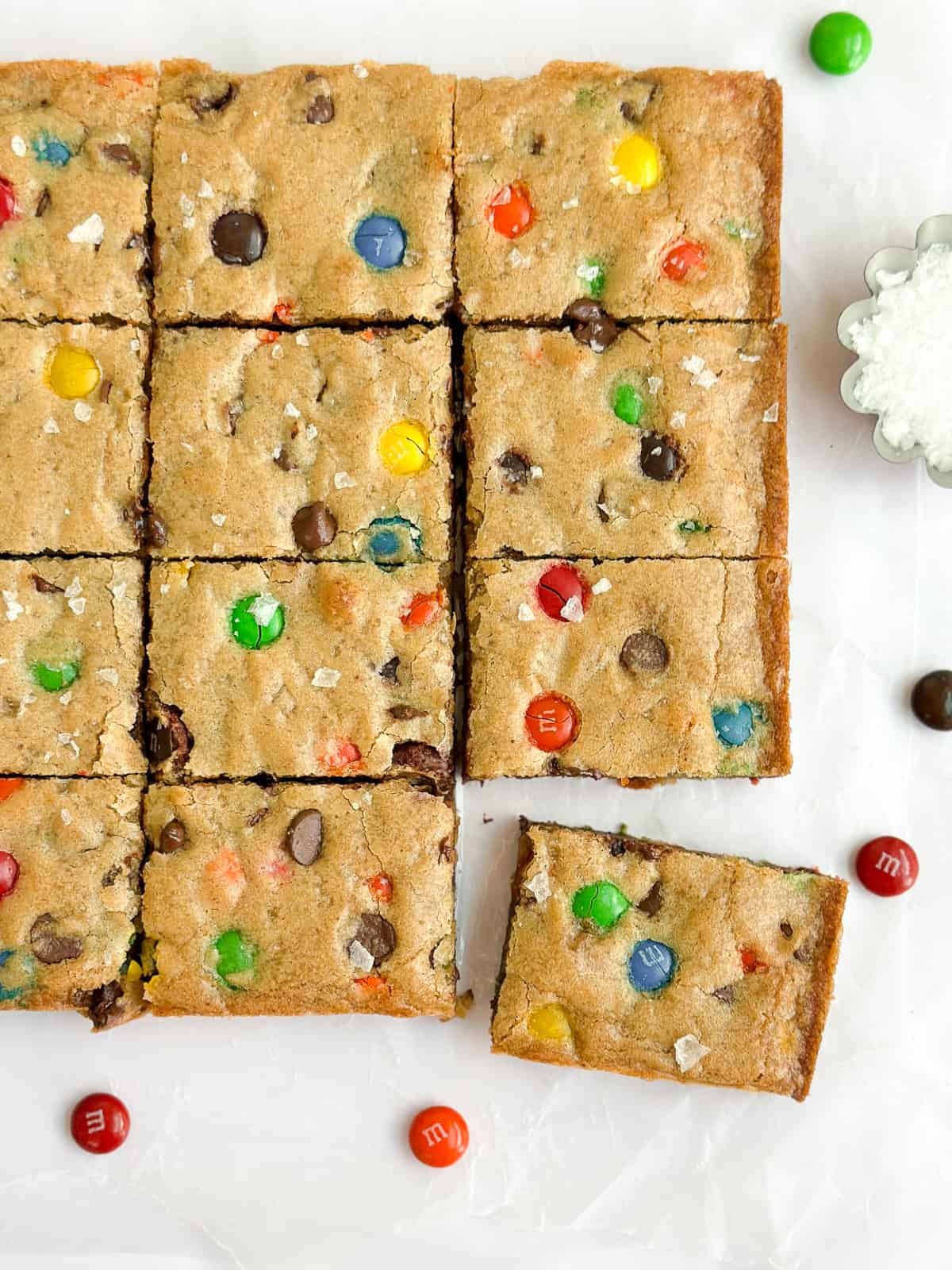 brown butter m&m blondies cut into squares.