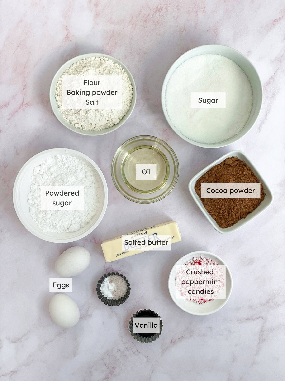 All of the ingredients needed to make chocolate peppermint crinkle cookies.