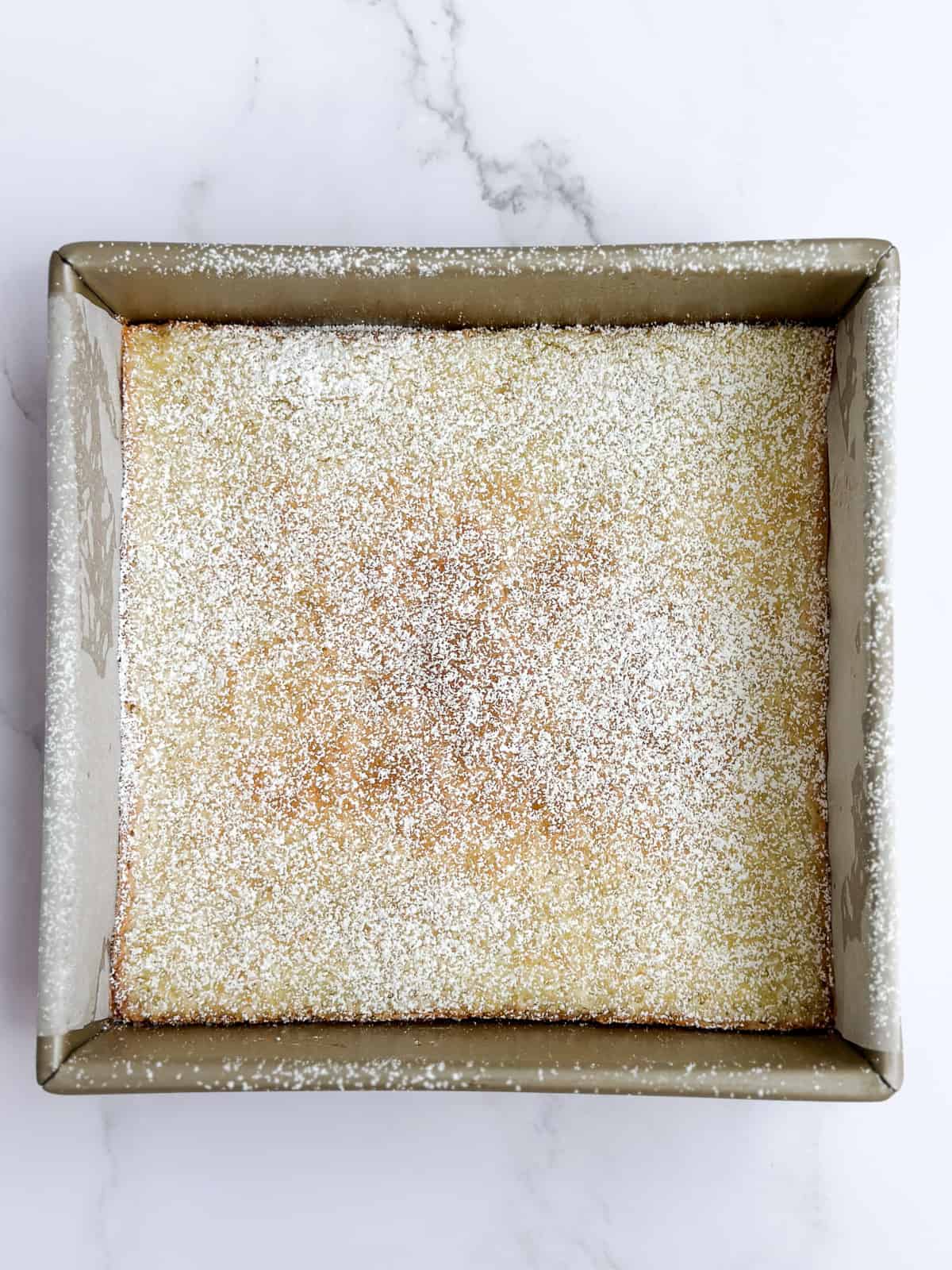 lemon bars with powdered sugar sprinkled on top.