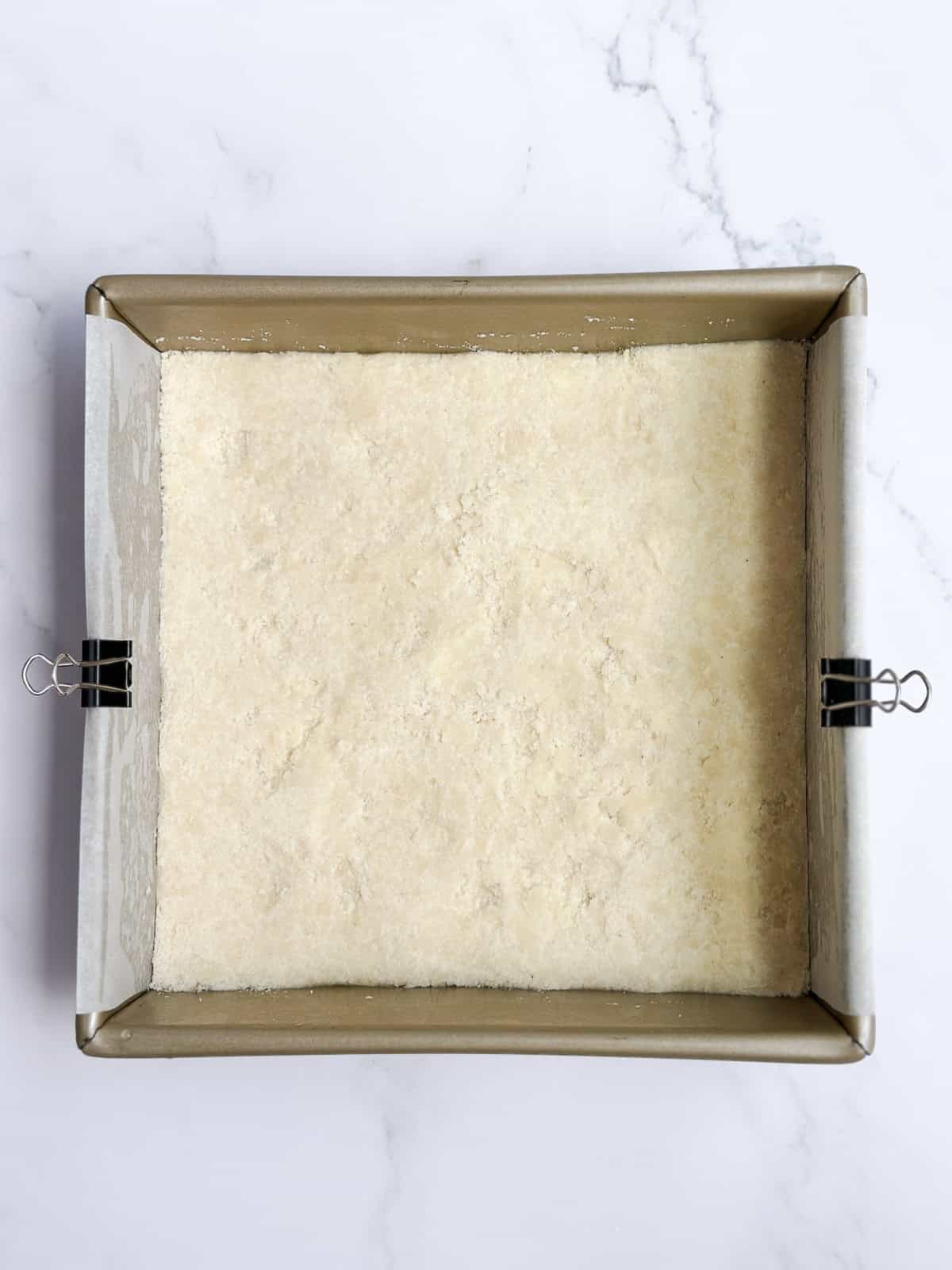 the crust pressed into the pan for baking.