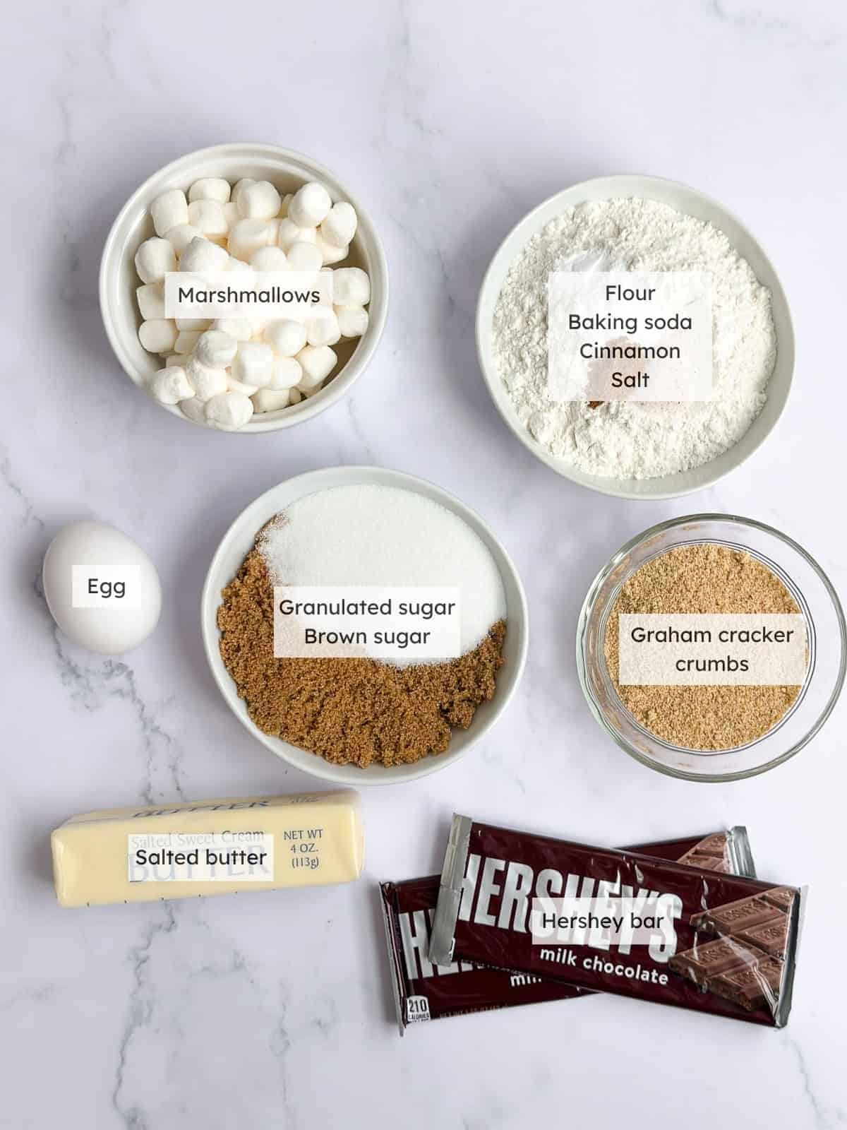 All of the ingredients needed to make Smore's cookie cake.