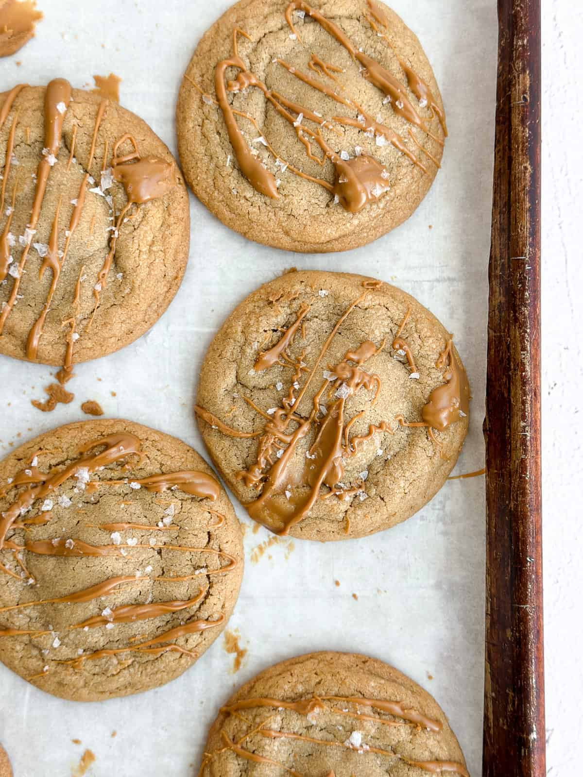 a row of biscoff cookie butter cookies on the baking sheet.