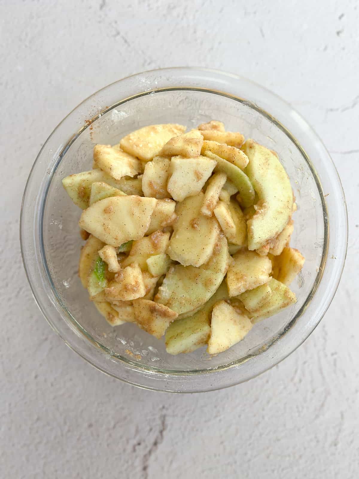 apples sliced and in a bowl.