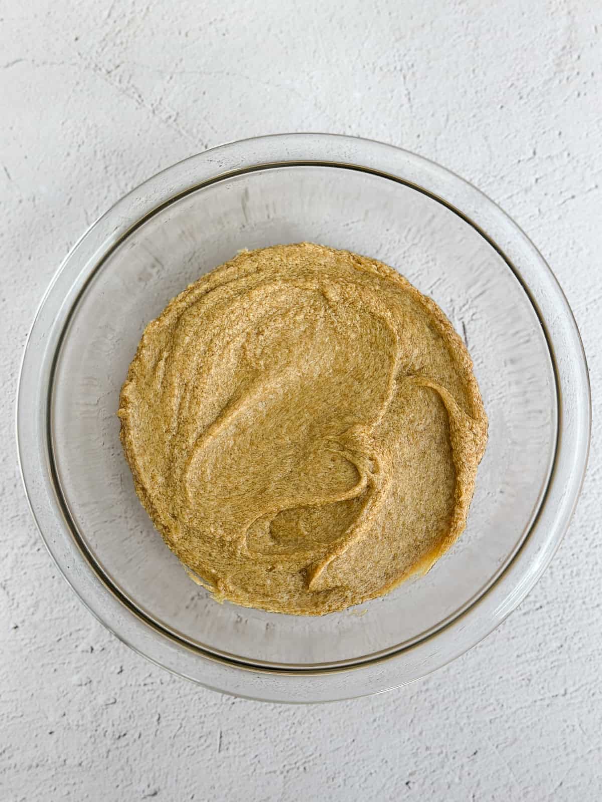 adding in the molasses, egg and vanilla.