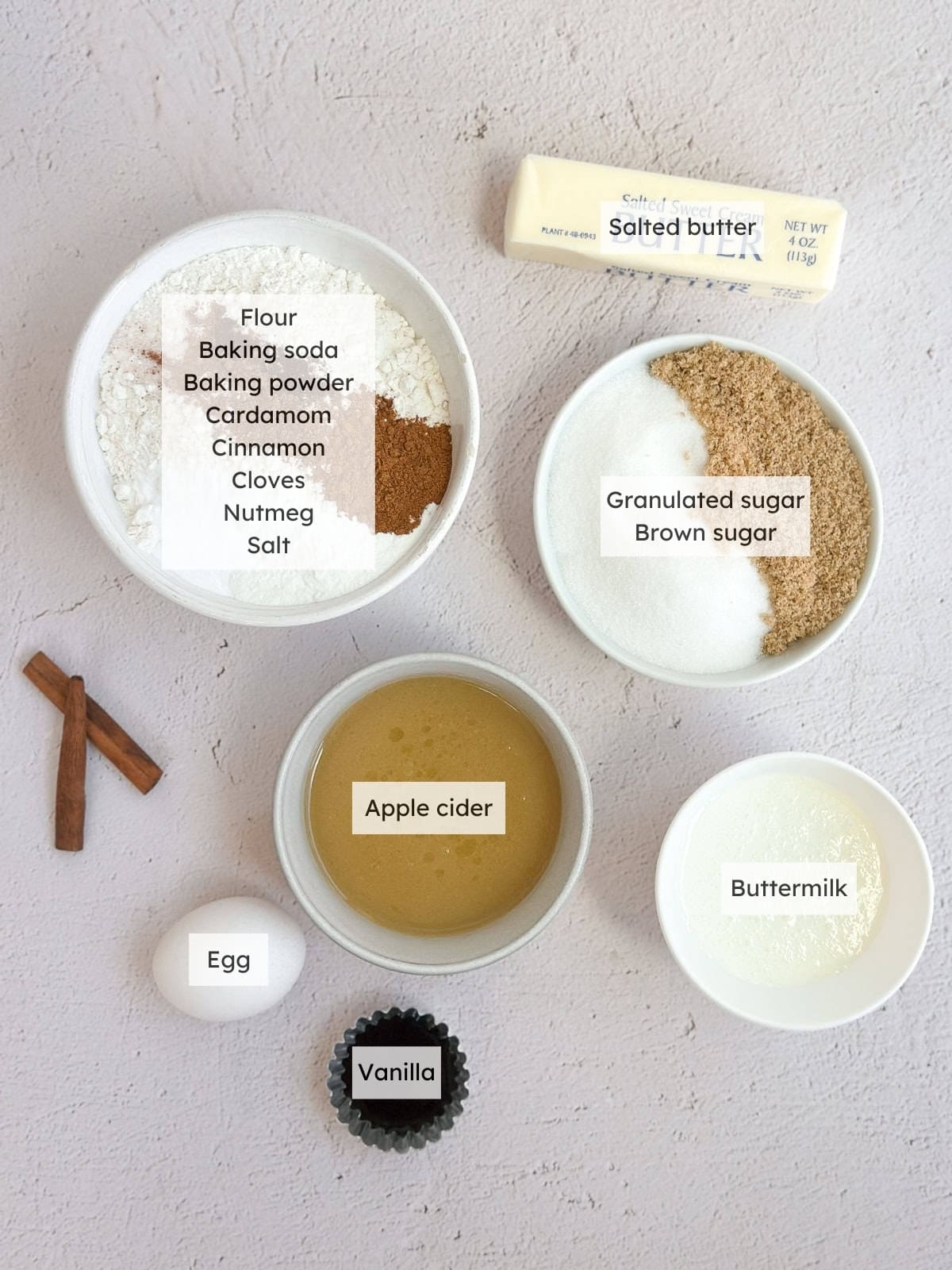 All of the ingredients needed to make apple cider donuts.