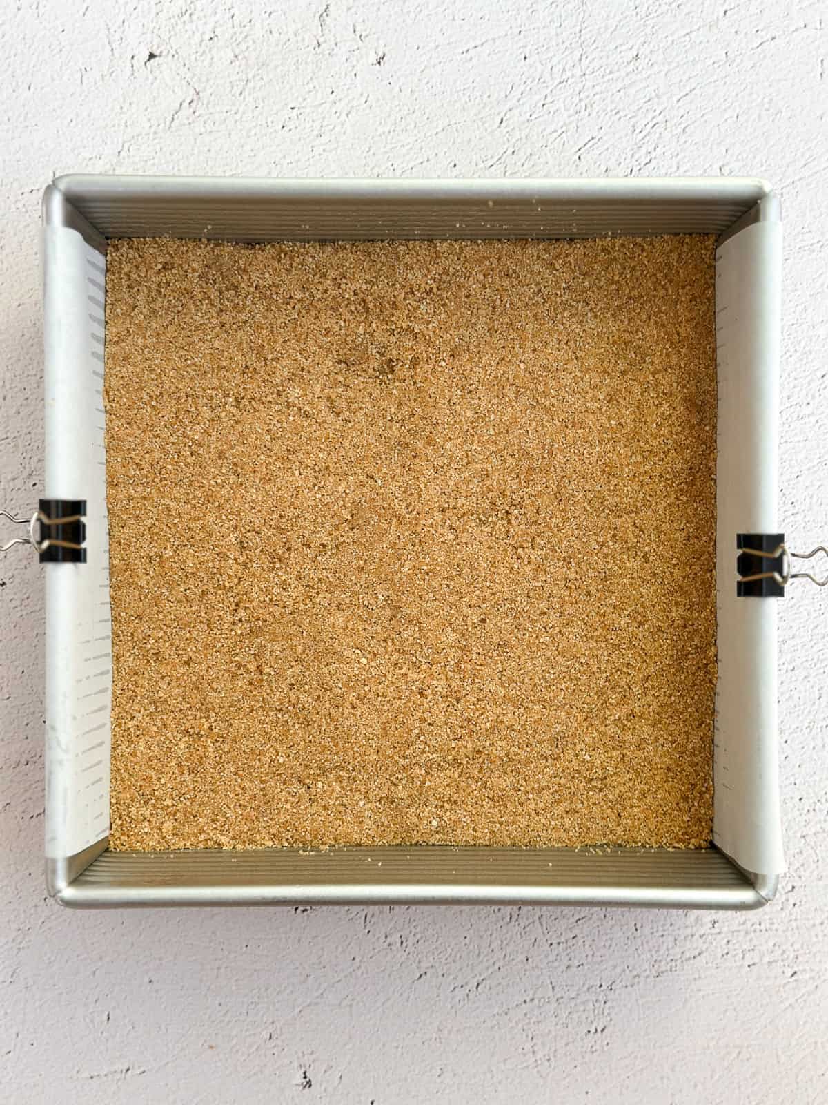 graham cracker crust pressed into the baking pan.