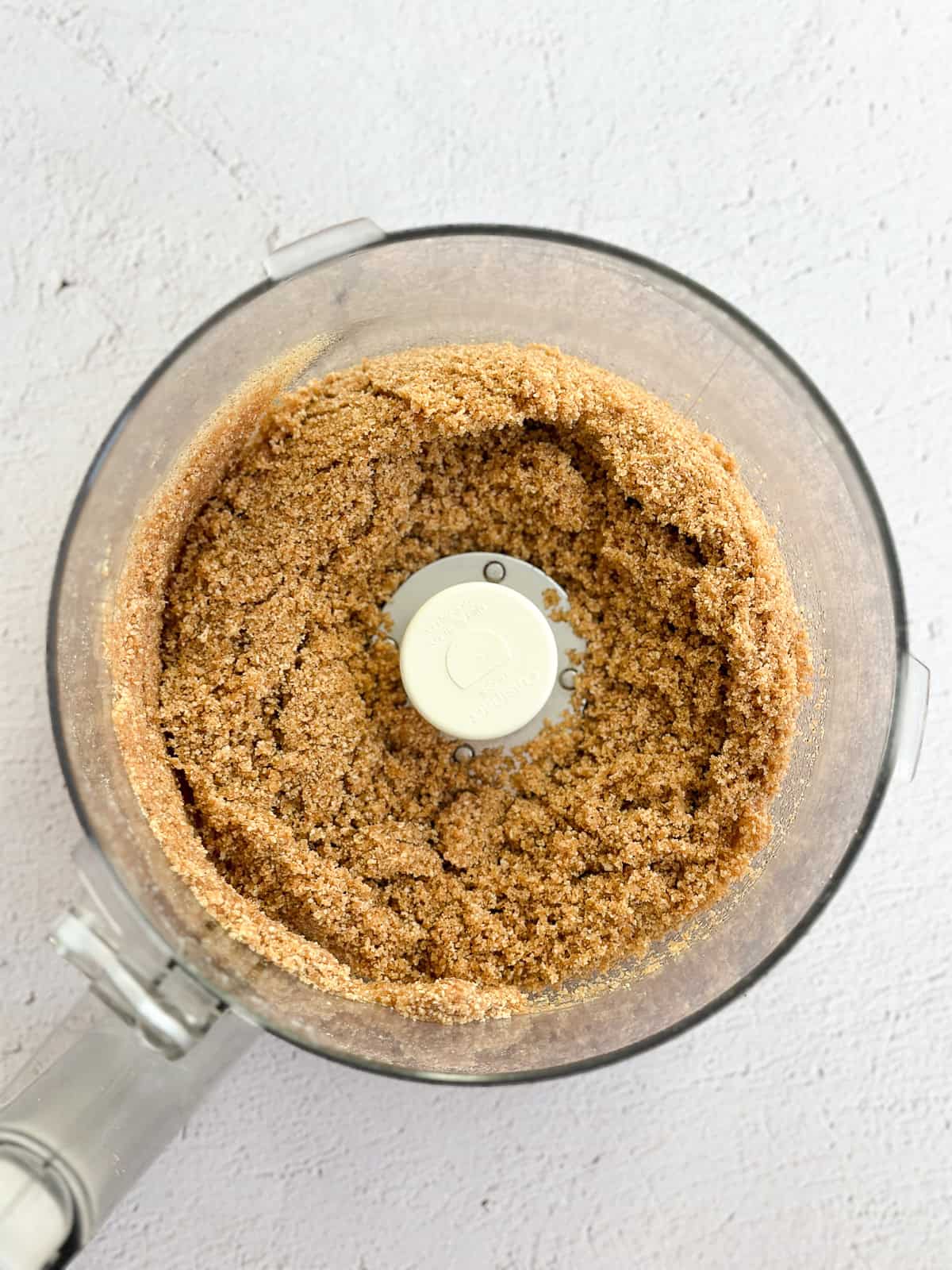 graham cracker crust mixed in a food processor.