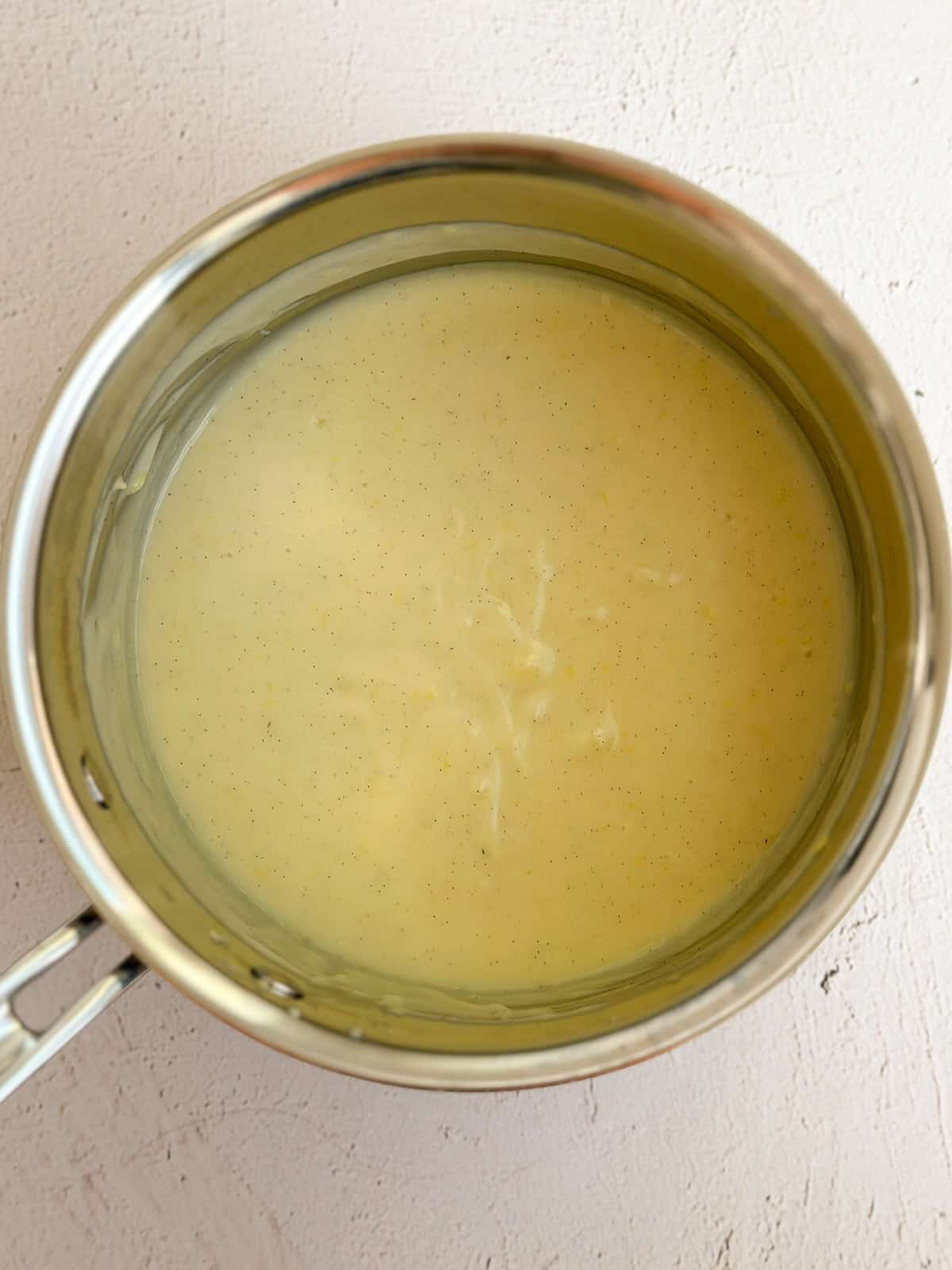 the pie filling inside the saucepan.