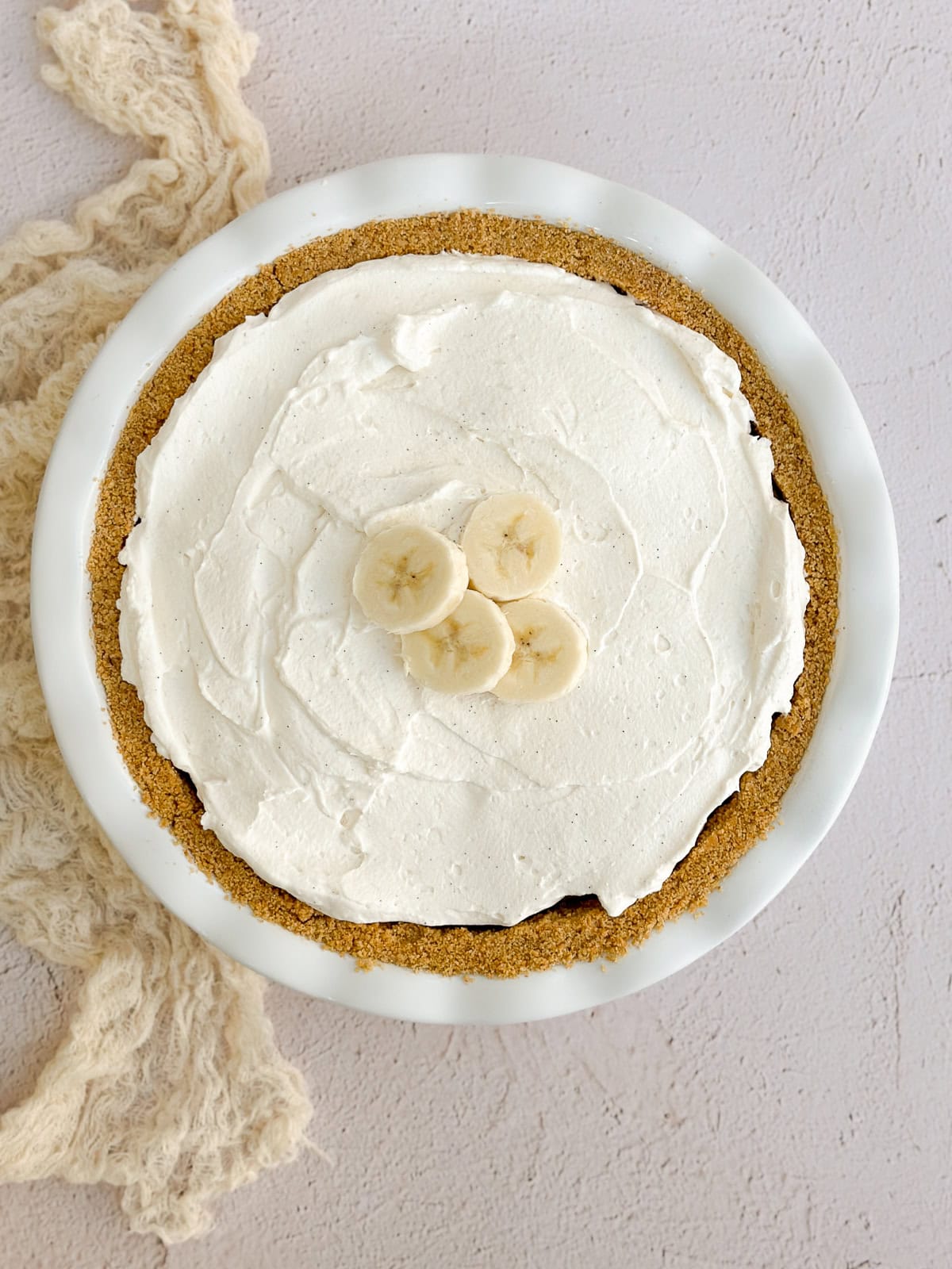 the whole pie topped with the whipped cream and extra bananas.