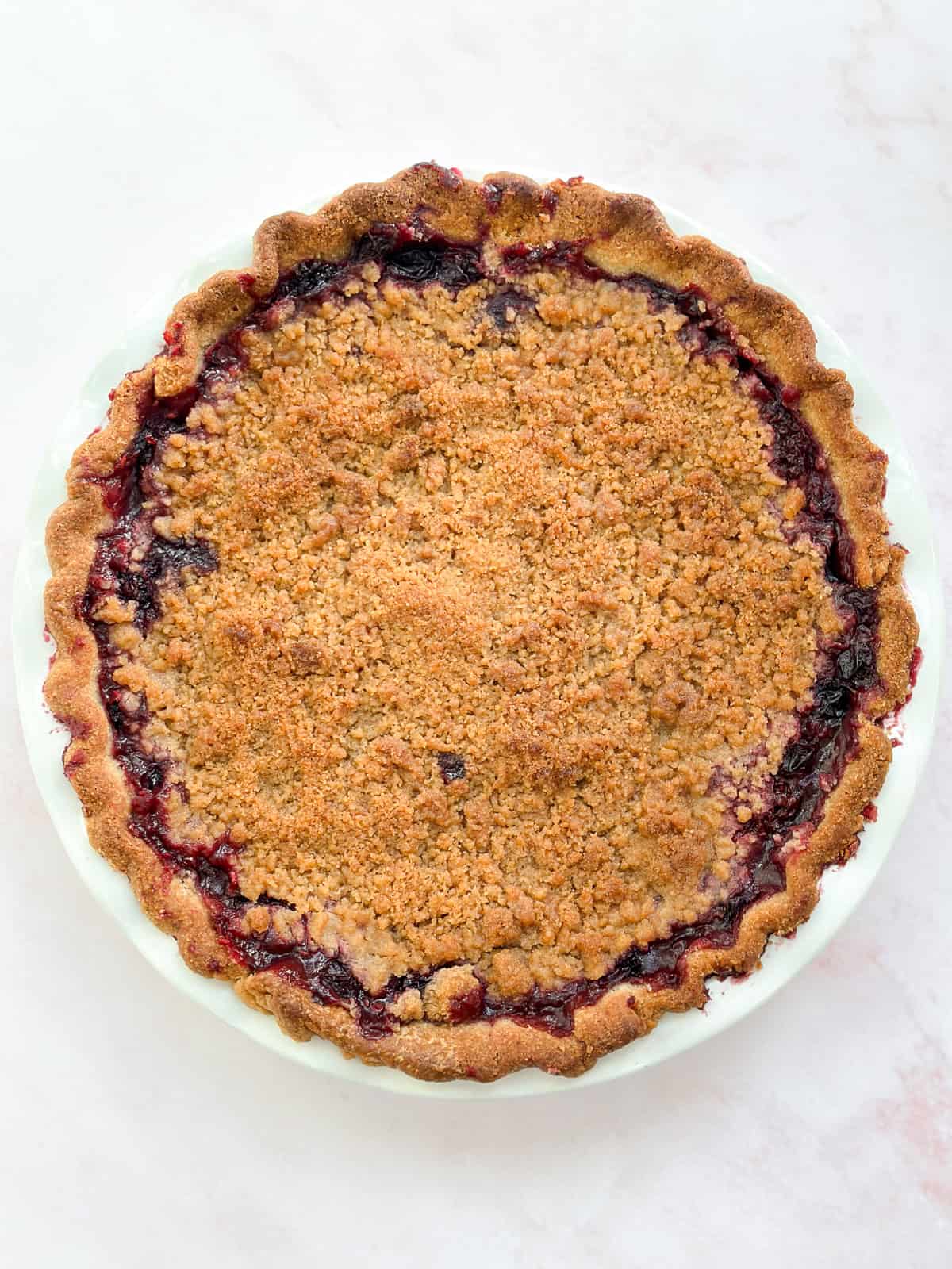 the whole mixed berry crumble pie after baking.