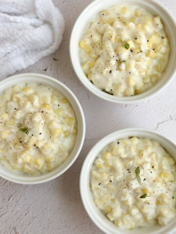 3 bowls filled with this easy creamed corn.