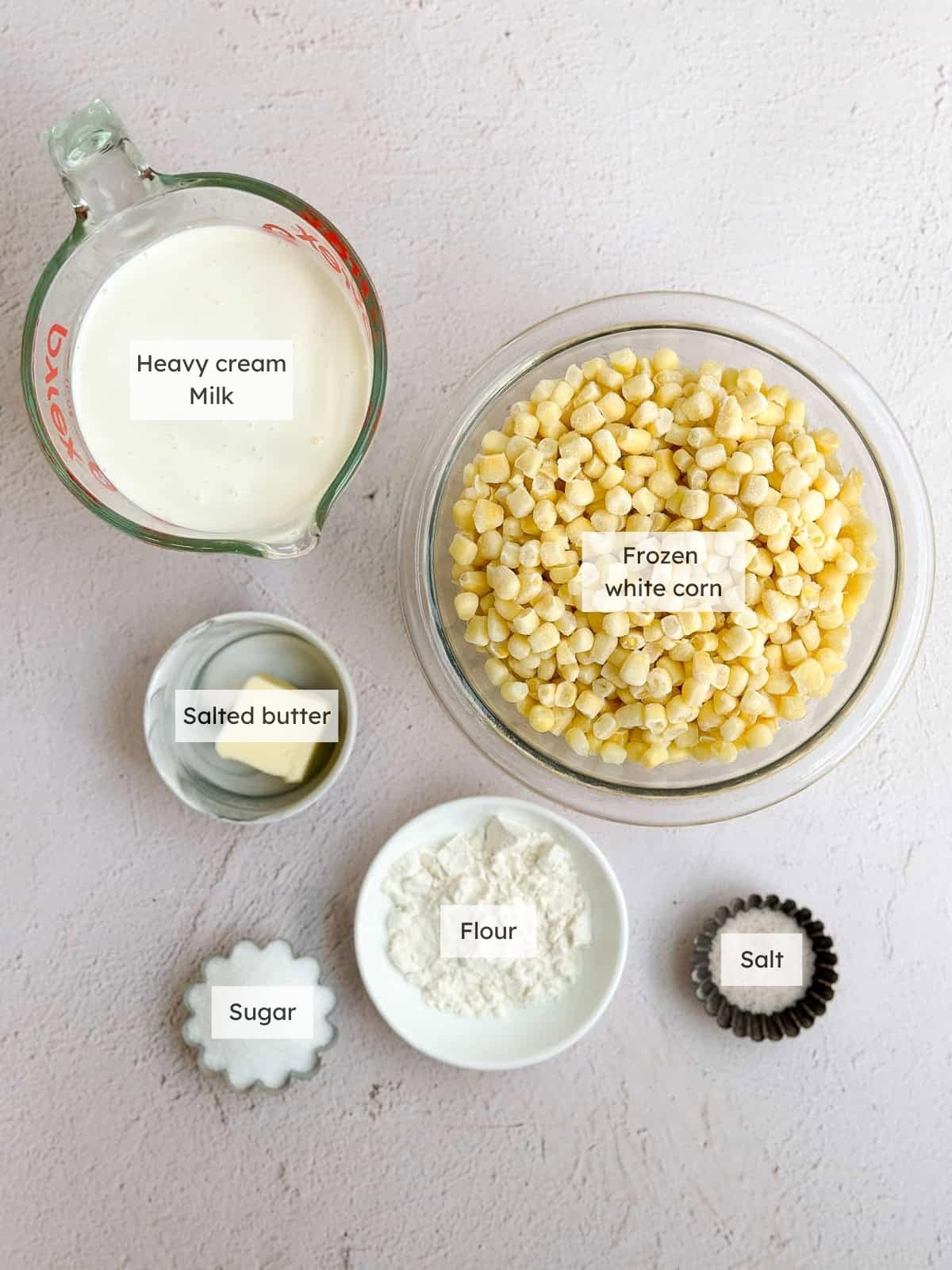 All of the ingredients needed to make creamed corn.