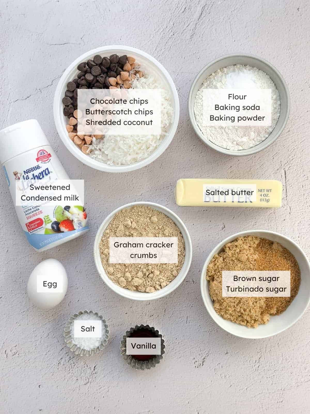 All of the ingredients needed to make hello dolly cookies.