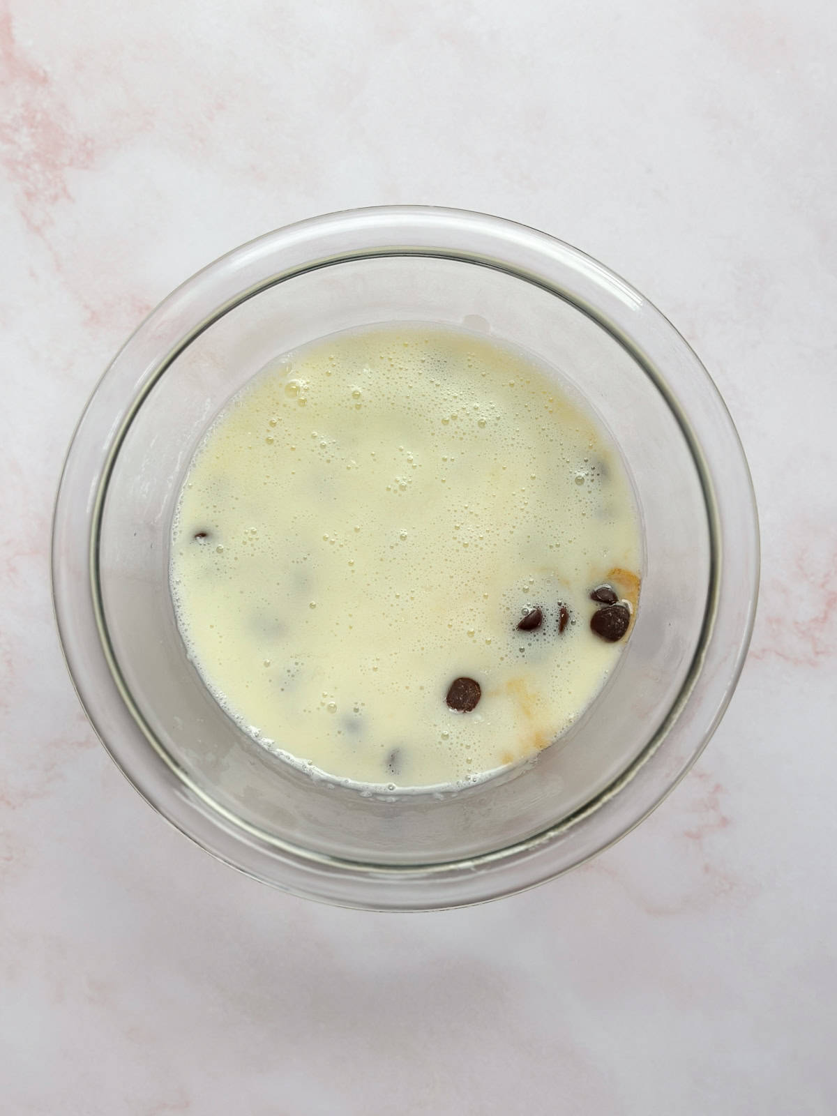 all the ingredients in the bowl for the chocolate ganache.