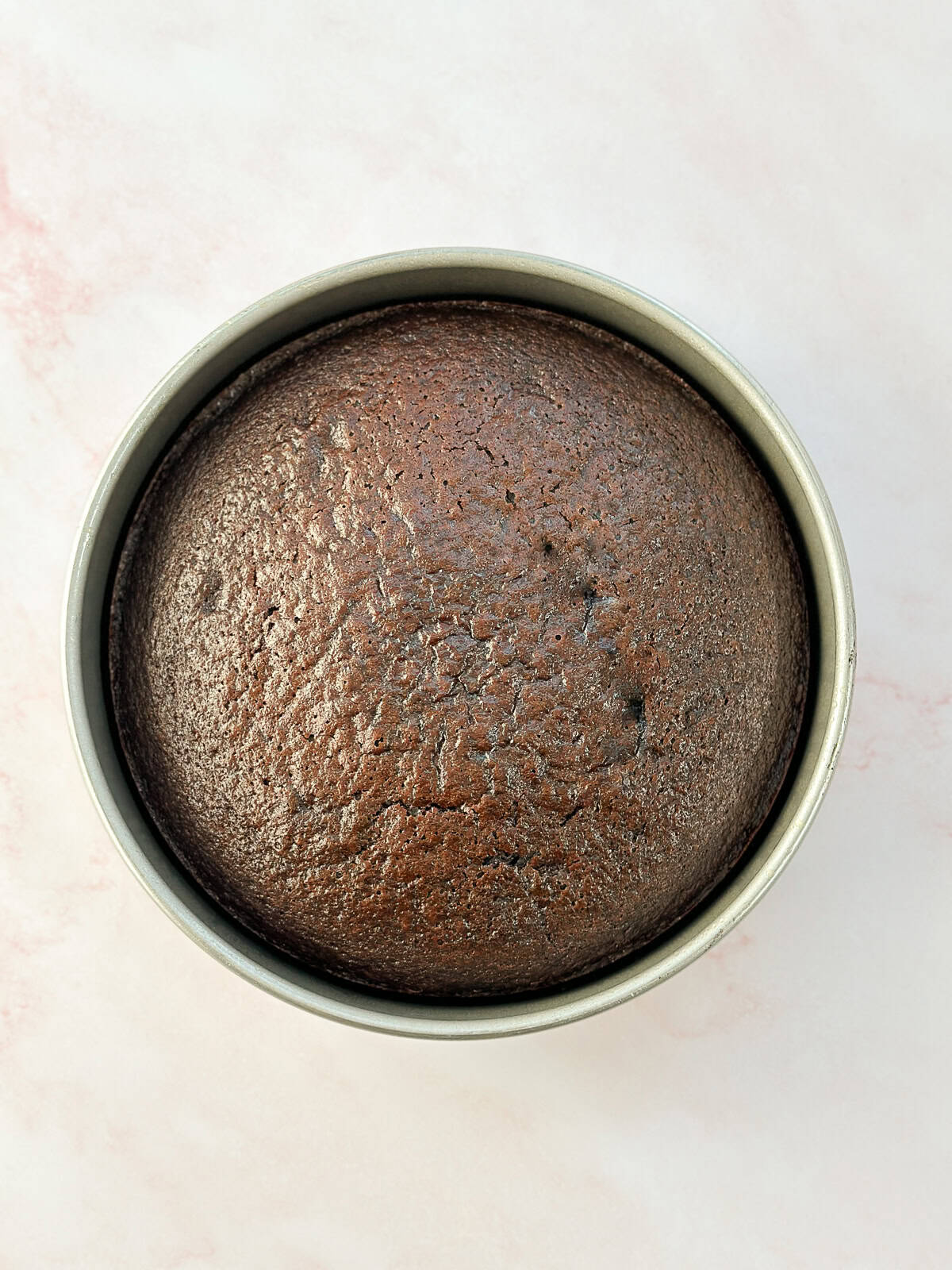 single layer of chocolate cake after baking.