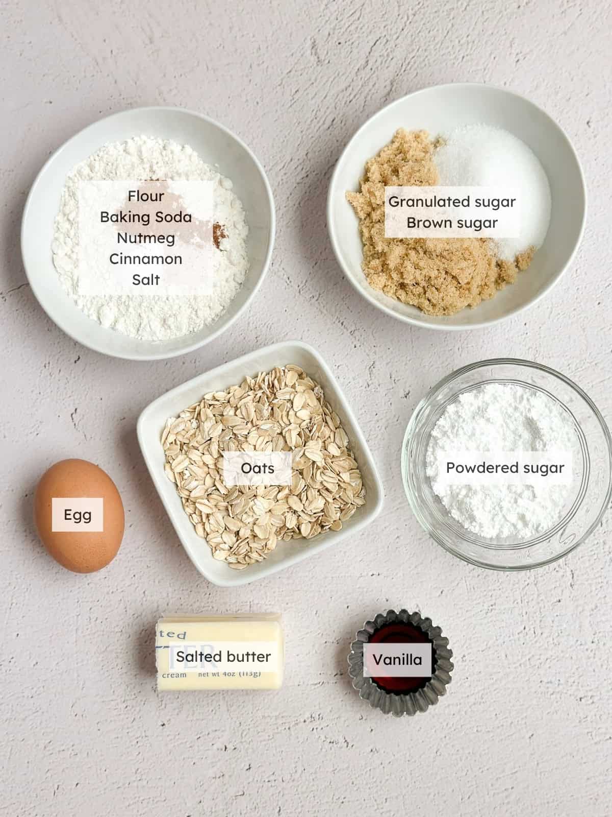 All of the ingredients needed to make small batch oatmeal cookies.