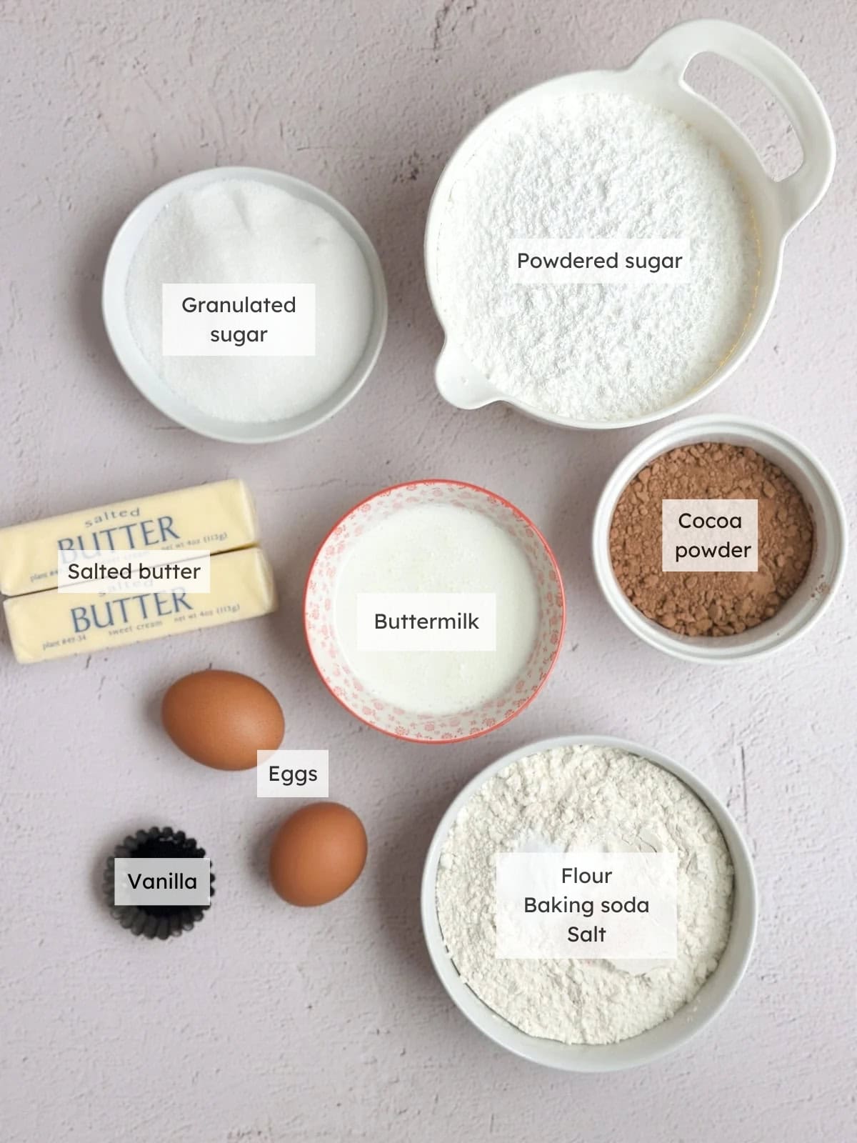 All of the ingredients needed to make chocolate buttermilk Texas sheet cake.