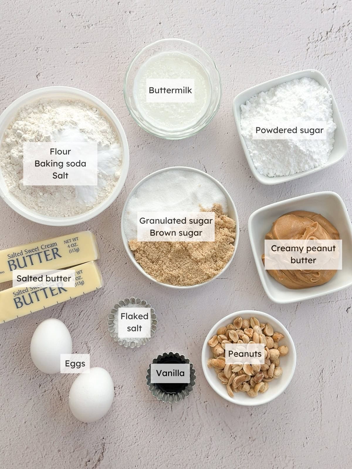 All of the ingredients needed to make peanut butter sheet cake.