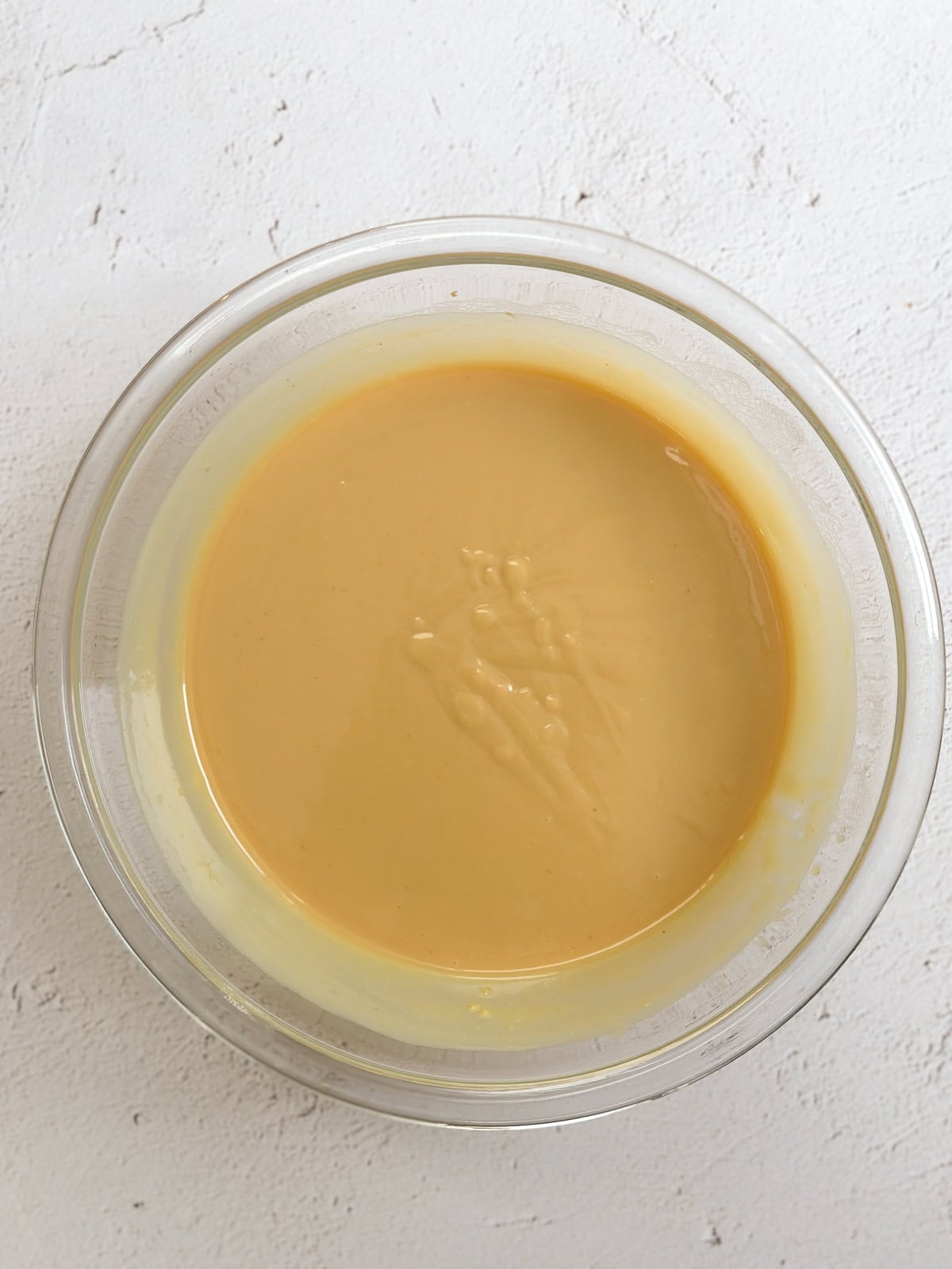 vanilla pudding mixture in a bowl.