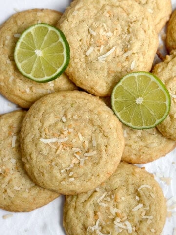 Lime Coconut Cookies all stacked together.