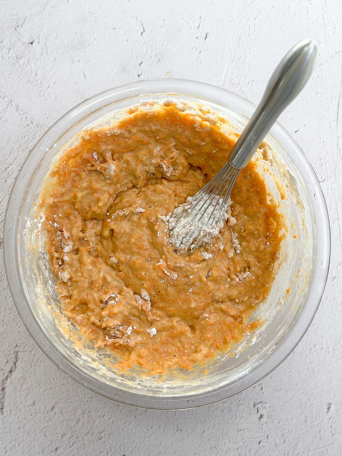 mixing in the dry ingredients with a whisk.