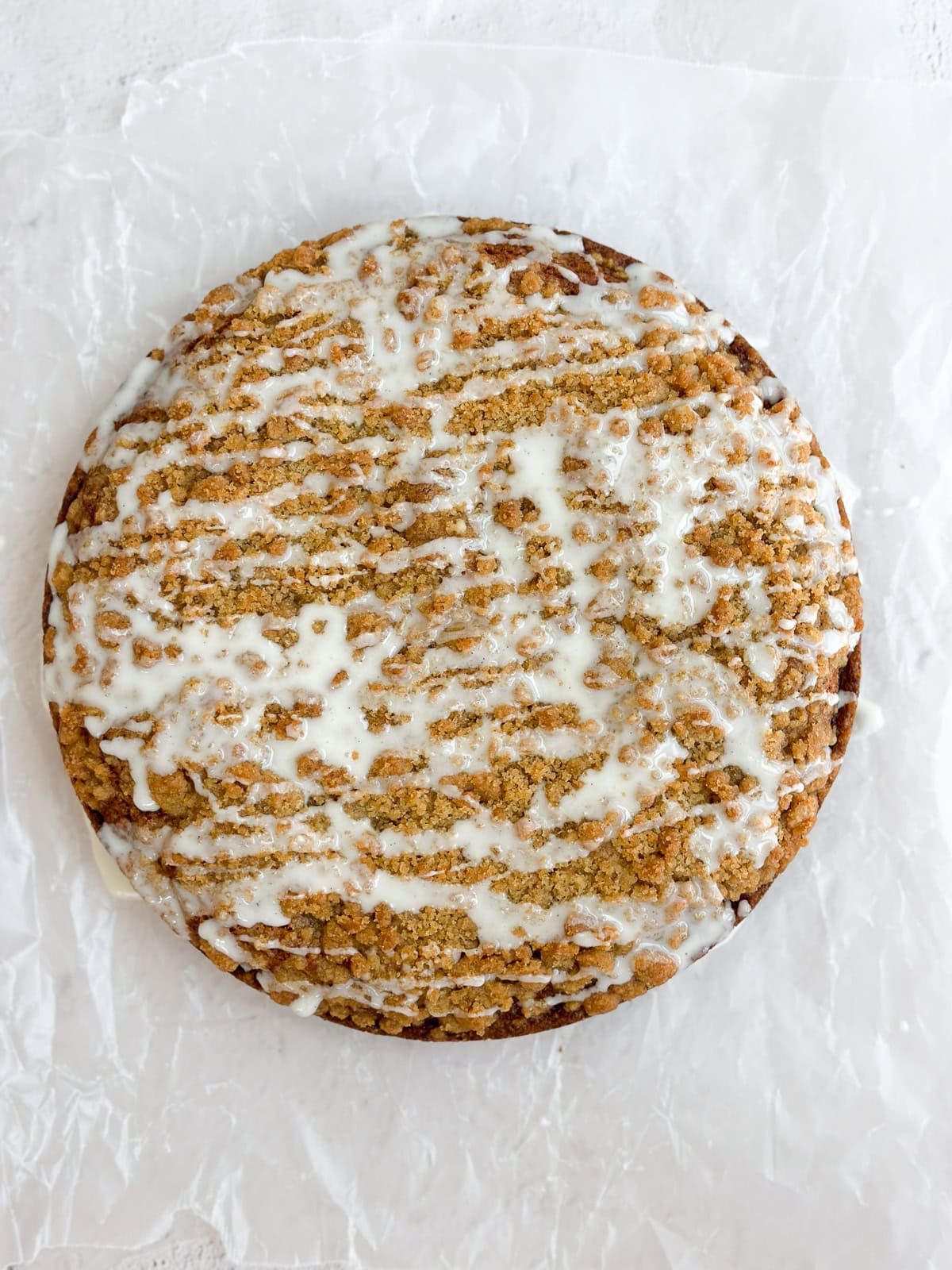 carrot cake coffee cake after drizzled with vanilla glaze, ready to serve.