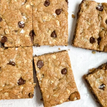 a few of the browned butter oatmeal cookie bars cut into squares.