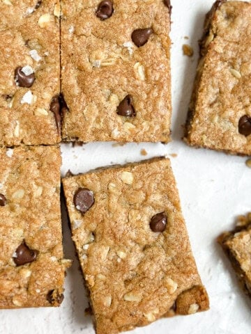 a few of the browned butter oatmeal cookie bars cut into squares.