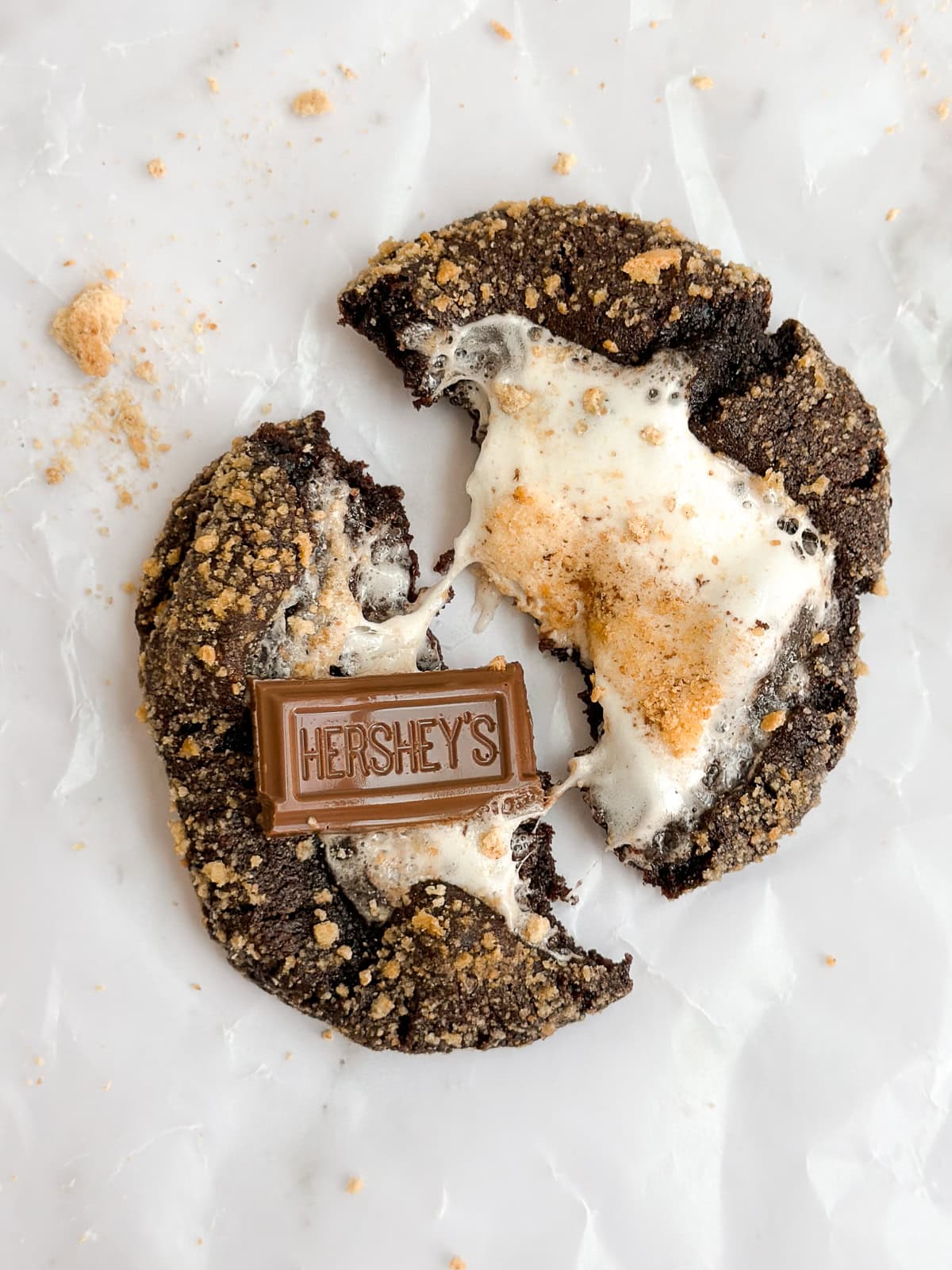 a close up of the marshmallow pull on a cookie.