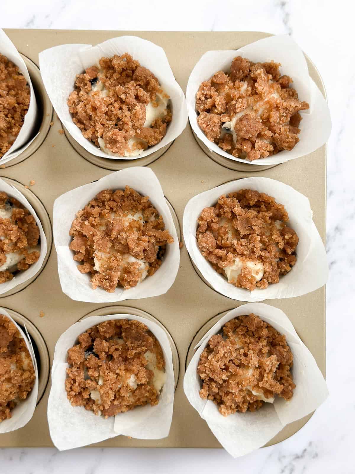 crumb topping on top of each muffin.