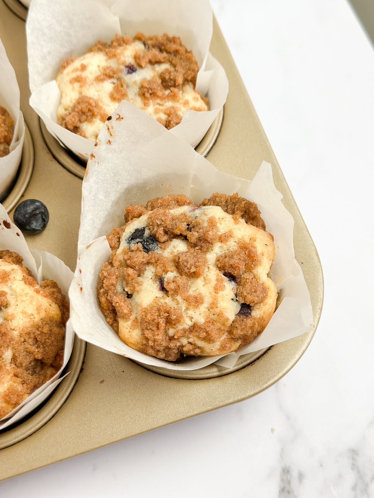 a close up of a few muffins.