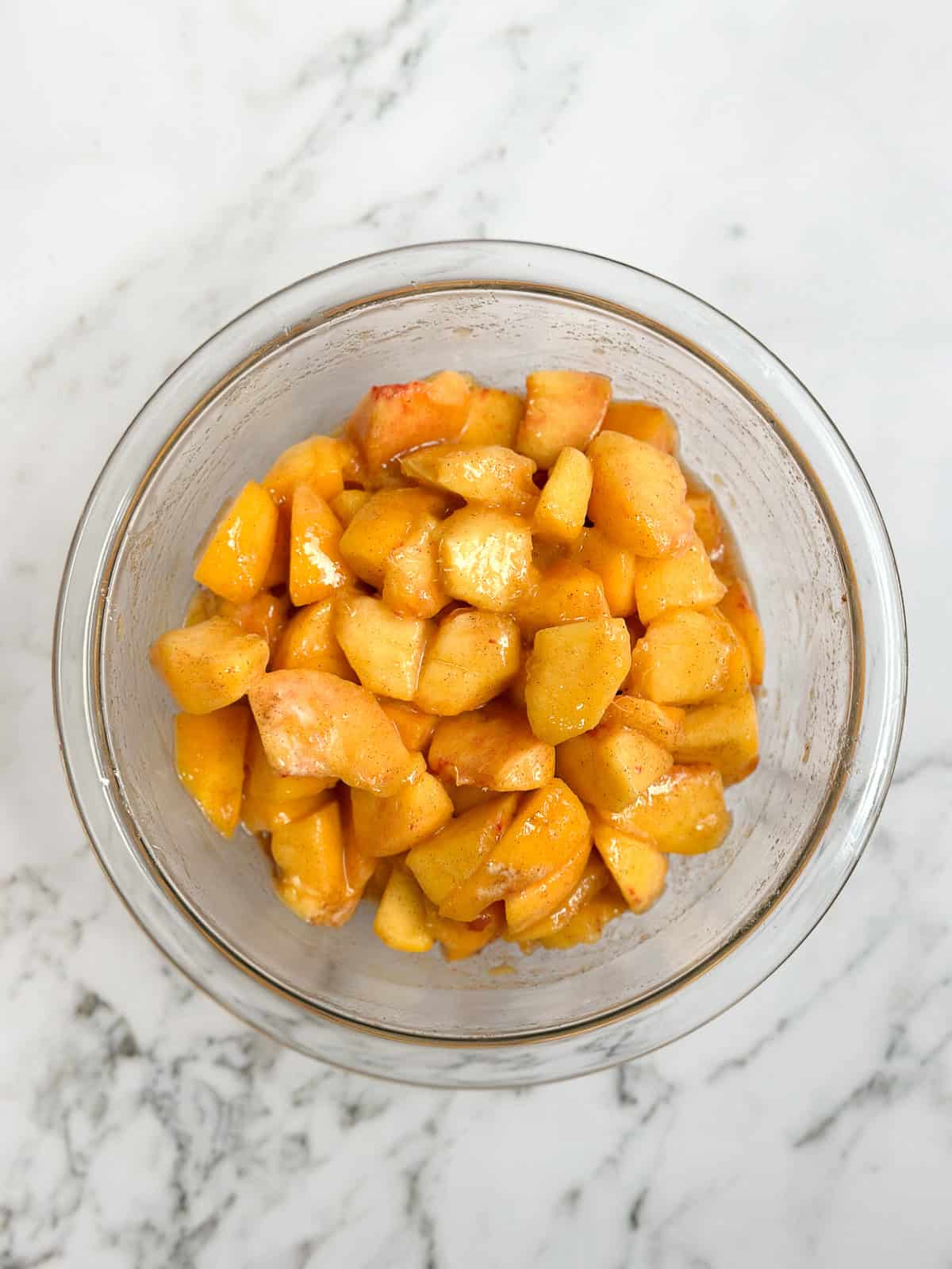 peaches mixed with sugar.