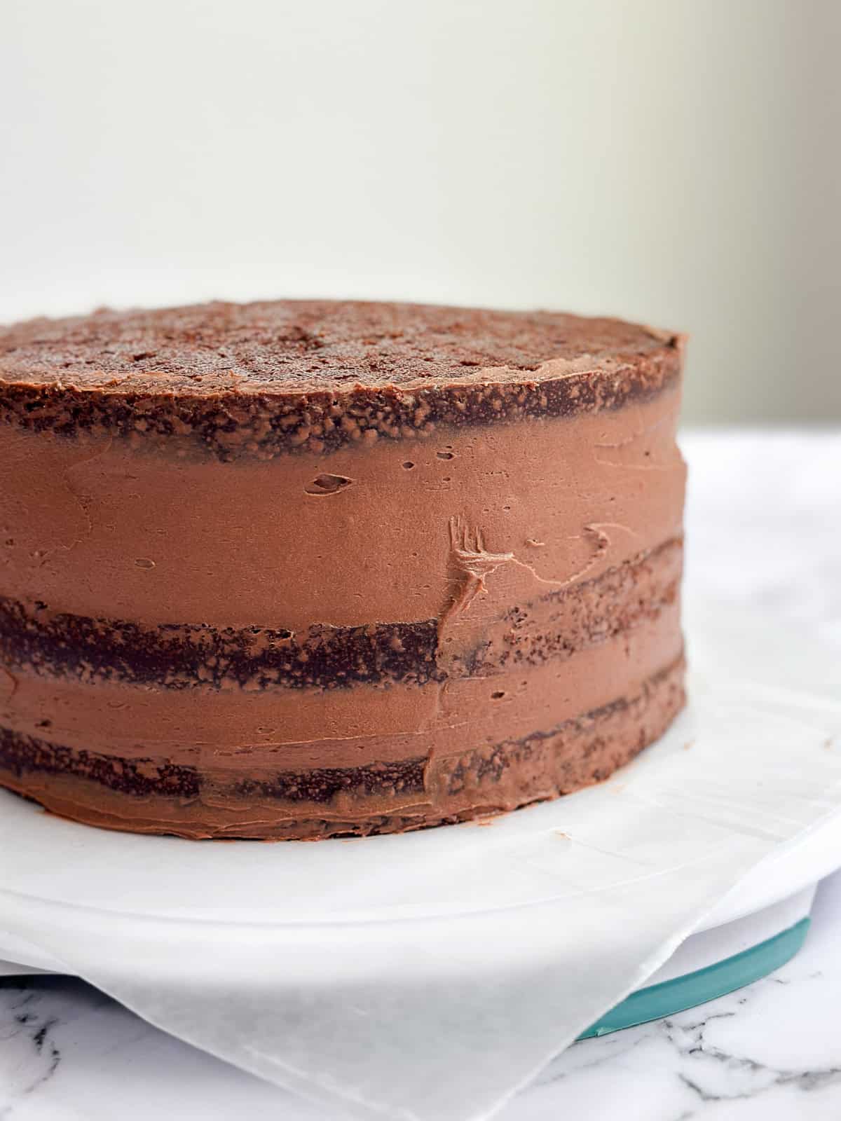 crumb coating of frosting.