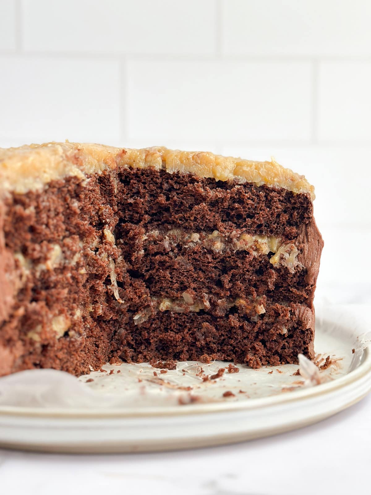 the homemade german chocolate cake cut so you can see the inside layers.