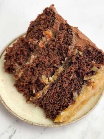 a slice of homemade german chocolate cake on a plate.